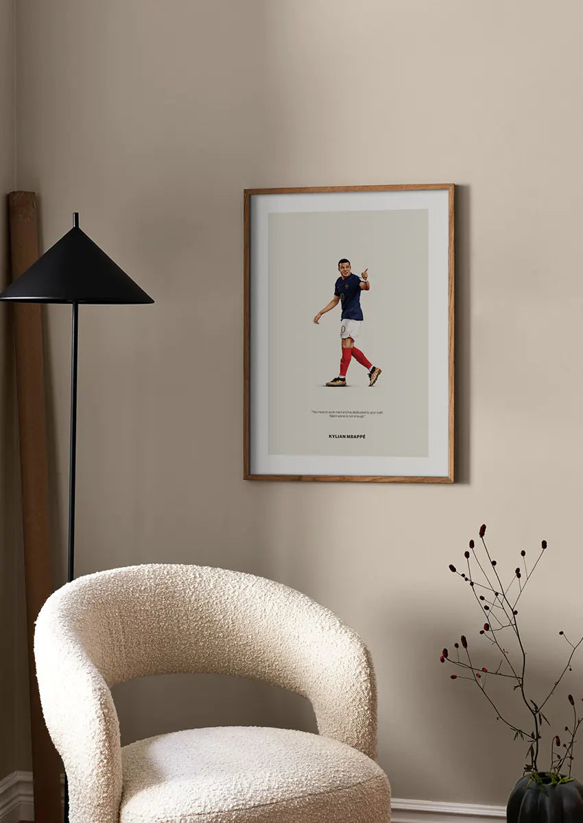 Soccer wall art of Mbappé pointing in blue national team kit