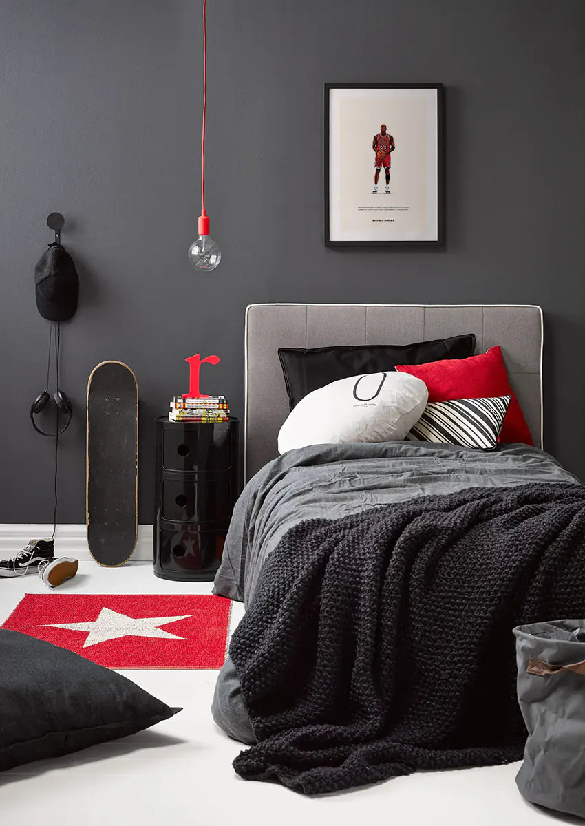 Inspirational basketball wall art of Michael Jordan pushing through obstacles