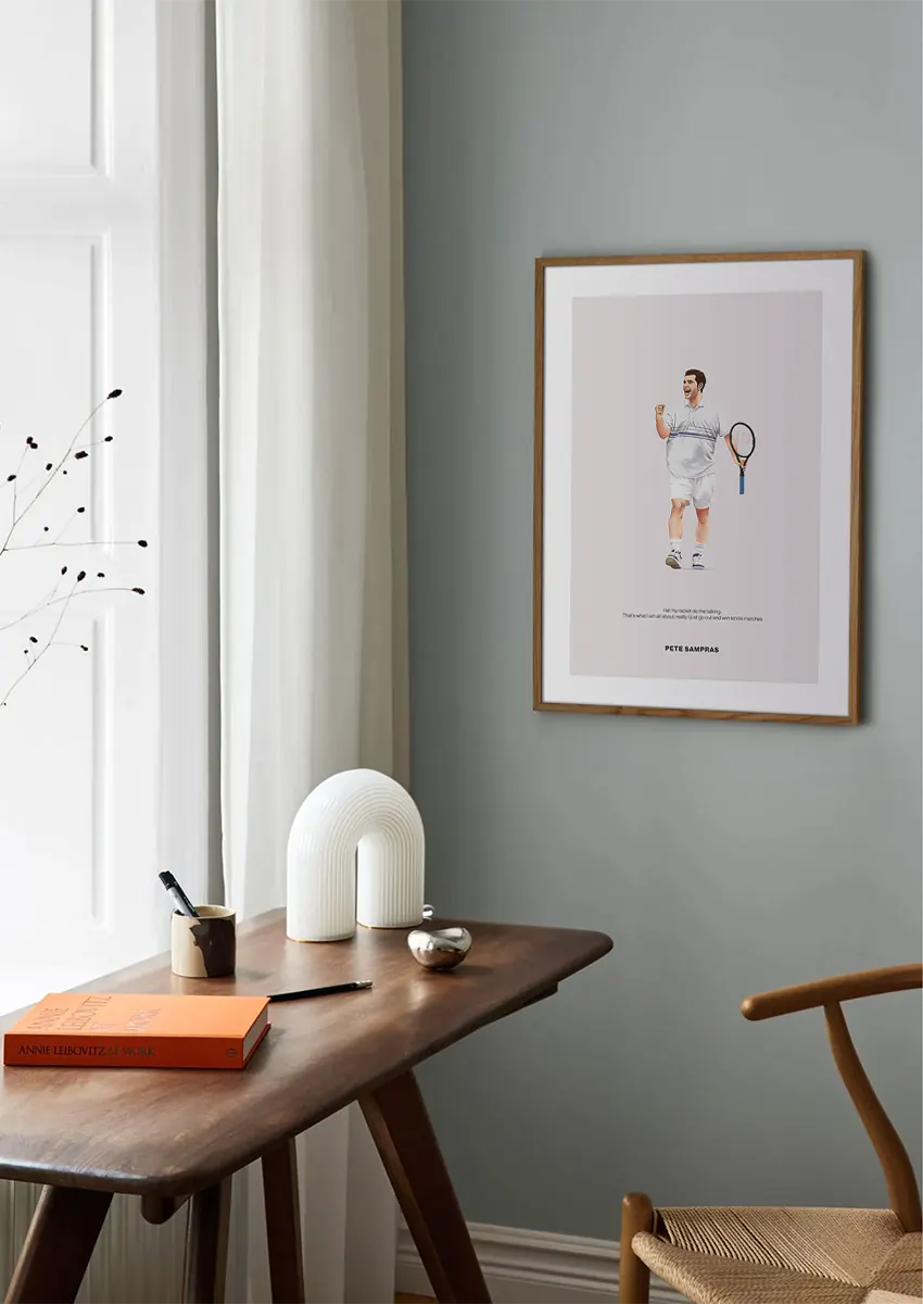 Tennis wall art of Pete Sampras celebrating a win in white outfit
