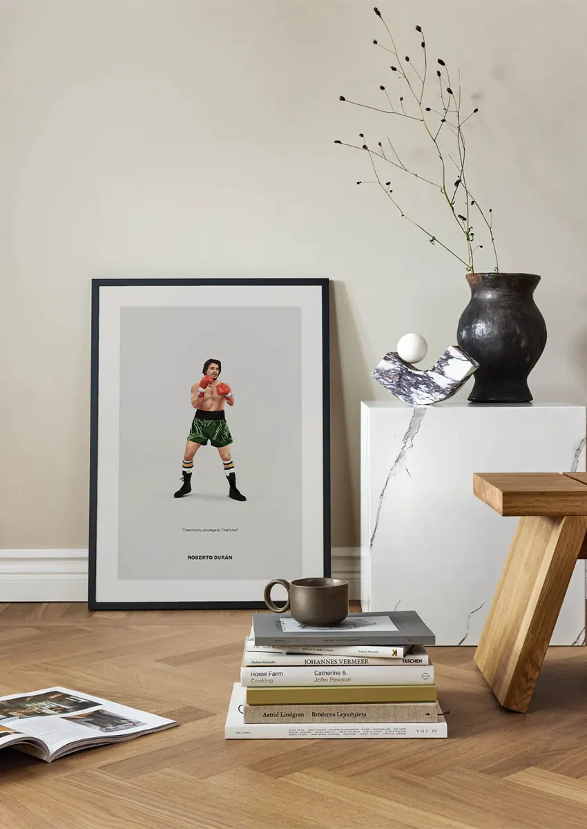 Boxing wall art of Roberto Durán with confident stance and retro socks